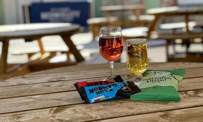 Outdoor seating is provided as a place to relax with a drink and snack.